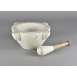 A marble pestle and stoneware mortar, with fruitwood handle, 31.5 cm diameter