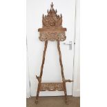 An Indonesian carved hardwood easel, 164 cm high