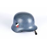 A German Army M35 single decal helmet, the grey painted helmet with the National Colour decal to one