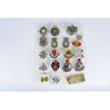 A collection of fire badges, to include Singapore, Queensland, USAF, ACT, plus a Fire Dept WA.