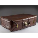A vintage leather suitcase by Crouch & Fitzgerald, 66cm, some wear from usage