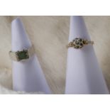 Two 1970s Middle Eastern gold and gem set rings, one a solitaire, the other with an emerald and