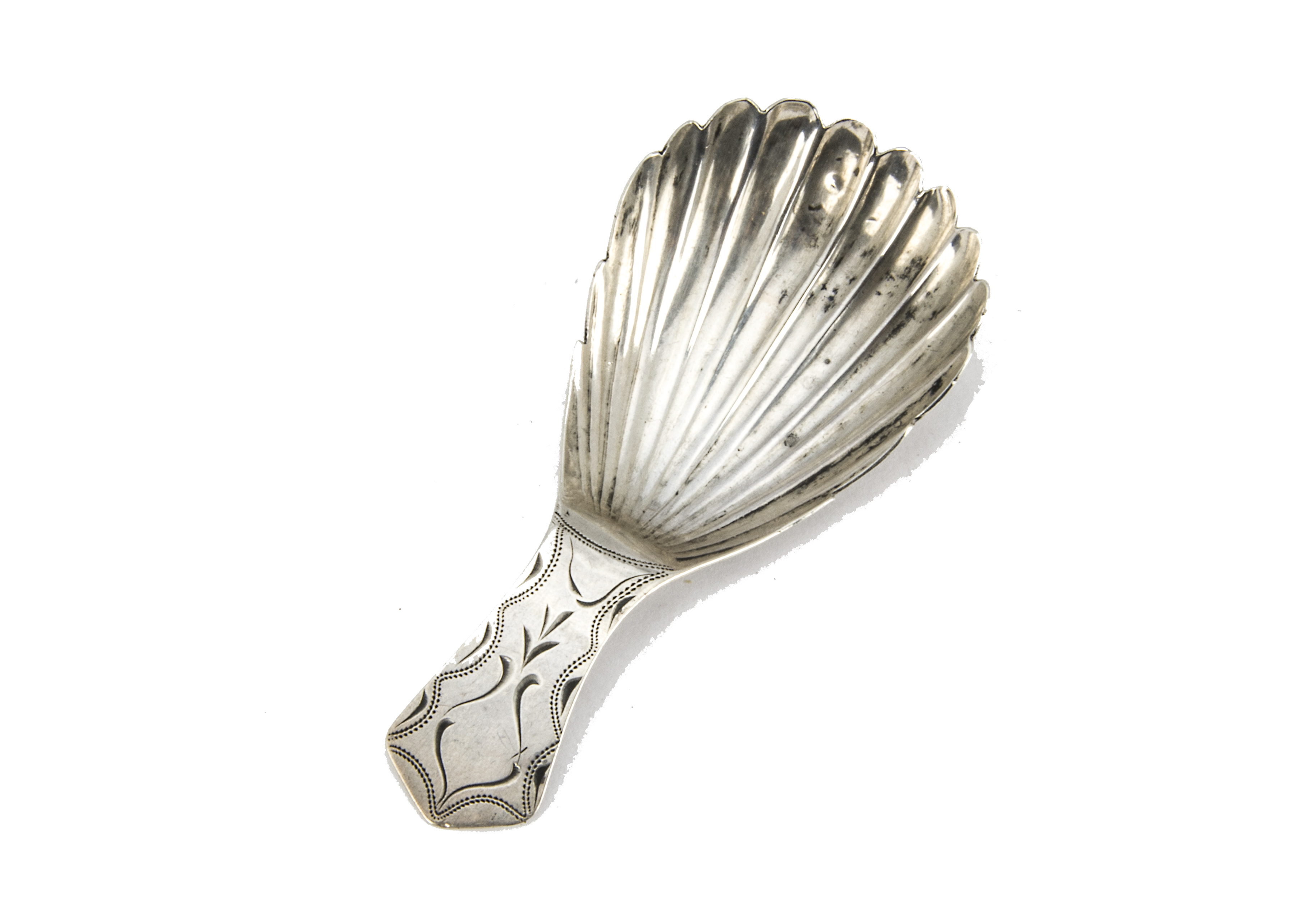 A George III silver tea caddy spoon, shell shaped bowl with brightcut handle, marked WWWP or similar