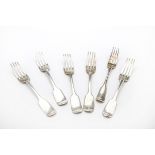 A Georgian and Victorian harlequin set of silver fiddle pattern dinner forks, three matching by