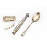A silver snuff box, together with a pair of Georgian pierced silver tongs, a mop and silver pocket