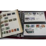 A collection of stamps and First Day Covers, in two boxes, including a ring binder with a school boy
