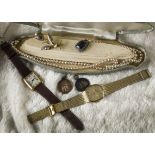 A collection of jewellery and watches, several gilt wristwatches, faux pearl necklaces, and more (