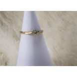 A 9ct gold and diamond solitaire engagement ring, 1.5g and size M