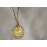 An Edward VII half sovereign pendant, the 9ct gold mount supporting the 1907 dated gold coin, on a