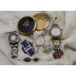 A collection of jewellery and other items, including several silver items, a pair of vintage