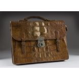 A vintage crocodile or alligator skin attaché case, some wear, 39cm wide