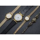A group of four ladies wristwatches, including two gilt examples with 9ct gold straps, a silver