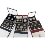 A collection of modern proof coins and sets, including several silver proof examples such as a