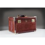 A vintage burgundy leather and suede from Must de Cartier, rectangular with hinged lid, logo to each