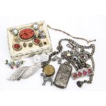 An Edwardian silver sovereign and vesta case, together with three silver Albert watch chains and a