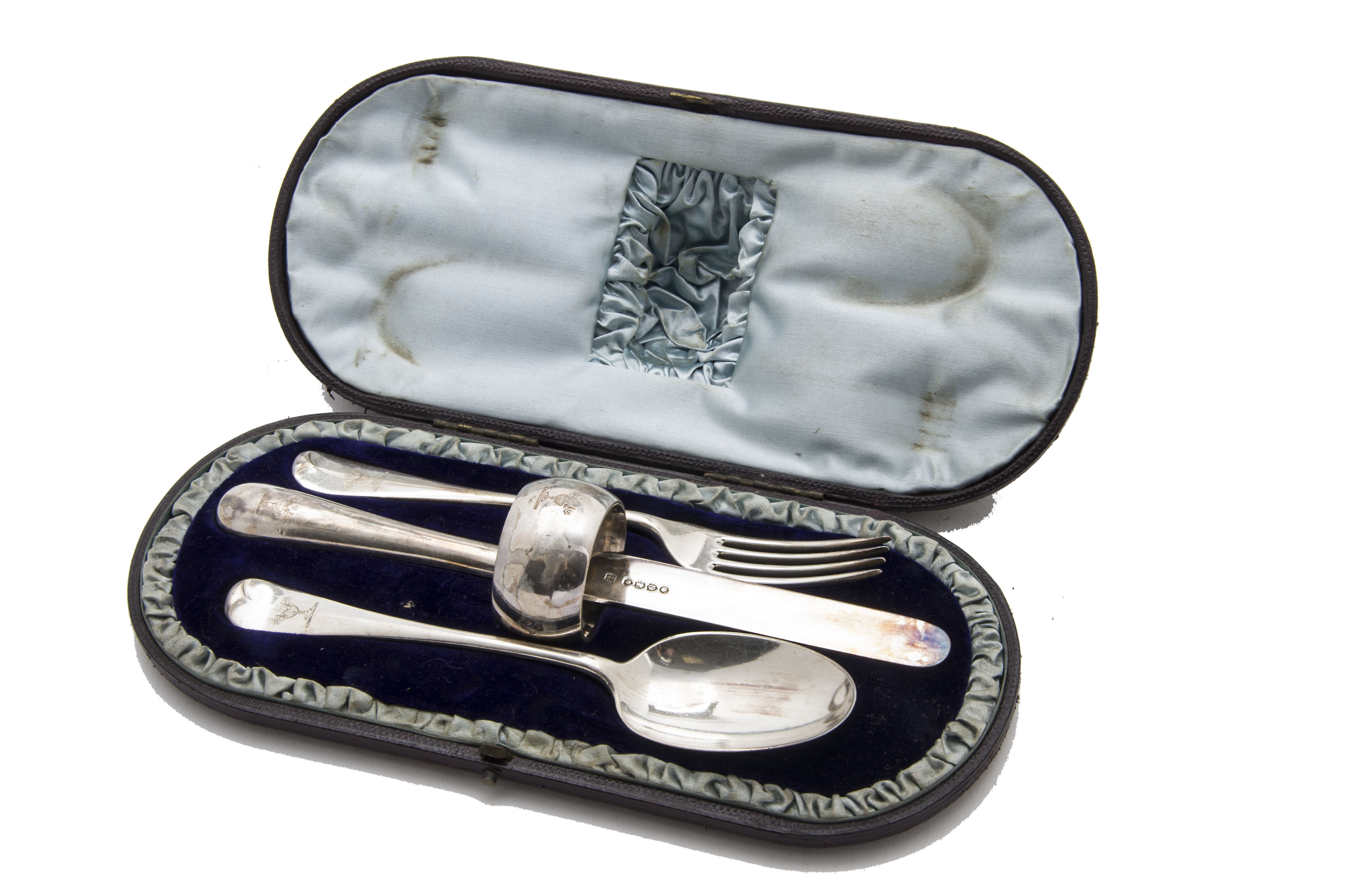 A Victorian silver Christening set by Edward Hutton, the fitted case with initials supporting an Old