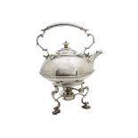 A George V silver tea kettle on stand by GH, the wide squat kettle having ivory finial and spacers