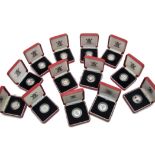 A collection of thirteen Royal Mint silver proof piedfort one pound coins, all boxed with