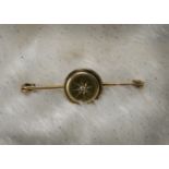 A Victorian 9ct gold and diamond brooch, the circular panel centred by an old cut on a bar pin, 4.7g