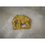 An Indian gilt metal brooch, in the form of an elephant, 3.2cm