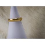 A vintage 22ct gold wedding band, plain outer, hallmarked, 6.6g and size N