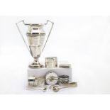 A collection of silver and silver plated items, including a 1950s silver marked trophy cup, six