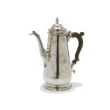 A good George II silver hot water pot by John Wirgman, tapered body bearing rampant lion family