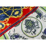 Two silk scarves, one with crown design similar to Julia Abadie, the other in green, white and blue,