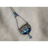 An Art Nouveau silver and enamelled necklace by Charles Horner, the pierced panel with green and