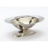 A modern silver footed dish by SRH, oval with hammered well, on spreading foot, Birmingham 1994, 4.