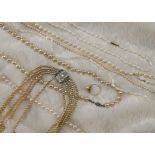 Three freshwater pearl necklaces, together with a bracelet, a mop bracelet three faux pearl