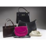 A group of six vintage and modern handbags, including a pink Charles Jourdan, a larger black