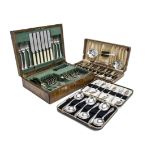 A collection of boxed flatware, including a set of six silver teaspoons, other silver plated