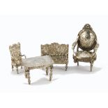 Four Victorian silver items of furniture, one Louis XVI fautaille by Berthold Muller, lacks front