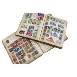 Two vintage Schoolboy stamp collection albums, both with some Victorian and early 20th century