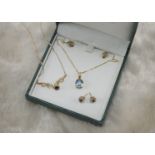 Two modern necklace and earrings sets, one with blue topaz, the other with sapphire and diamonds (6)