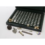 A collection of silver and other items, including a pair of 15ct gold cufflinks with gilt chains,