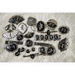A collection of Far Eastern niello white metal jewellery, most marked Siam Silver, including