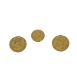 Three 19th century French gold coins, including two 20 Francs, 1851 and 1868, and a 5 Francs dated