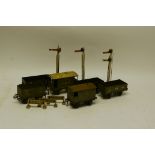 Bassett-Lowke O Gauge Tinplate Freight Stock and Signals, comprising 4 assorted open wagons
