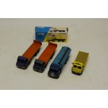 Dinky Supertoys and Corgi, Two play-worn Dinky Foden flat bed trucks, a Foden tanker in two tone