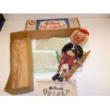 A Pelham Puppet 'Macboozle', with round wooden head, black velvet jacket and tartan kilt and