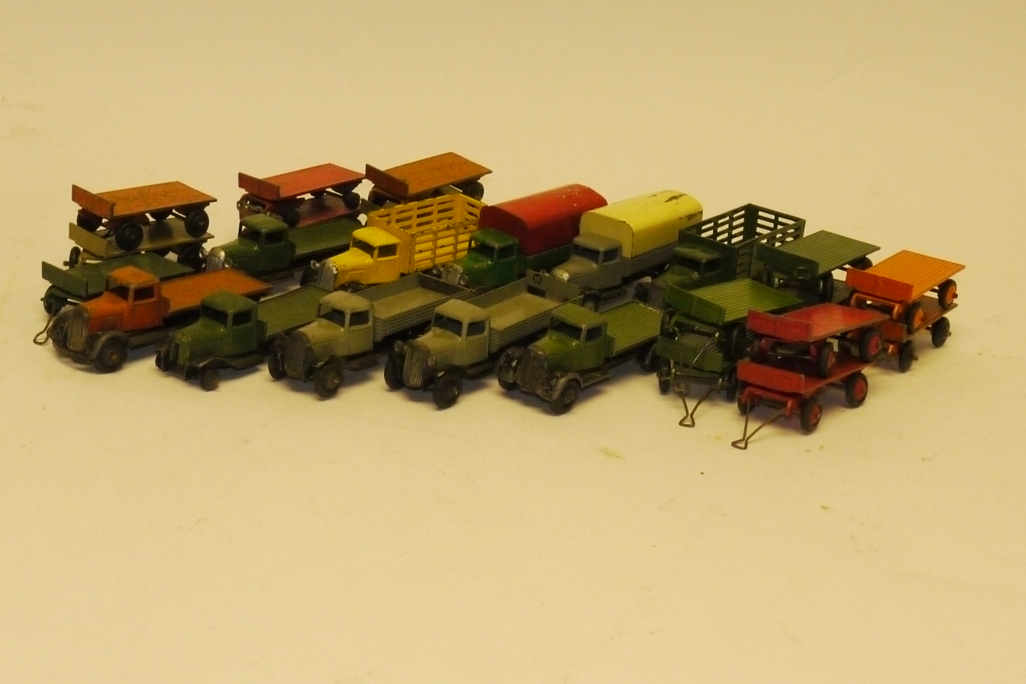 Play-Worn Dinky Toys Commercials, Comprising pre and post-war, Austin flat bed trucks, with two