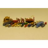 Early Matchbox Models and others A collection of un boxed examples including a car transporter