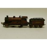 A Bing O Gauge Clockwork 'Apollo' Locomotive and Tender, in Midland Railway crimson as no 5000, F,