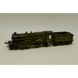 A Hornby O Gauge Clockwork No 3 Locomotive and Tender, in GWR green as no 4073 'Caerphilly