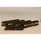 A Rivarossi O Gauge 2-rail American 4-4-0 Locomotive and Coaches, the loco repainted in Sierra RR