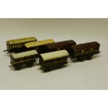 Early Carette and Bing O Gauge 4-wheeled Coaches, comprising two Carette 8" GWR brown/yellow coaches