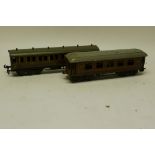A Bassett-Lowke O Gauge LMS 12-wheeled Dining Car and Saloon Coach, both in LMS crimson, the Diner