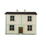 a homemade two story Dolls House, finished in cream with green detail, opening to front together